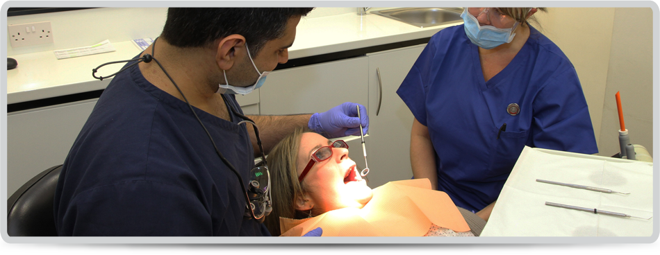 Dentist and dental nurse working at BST Dental Practice Shirley